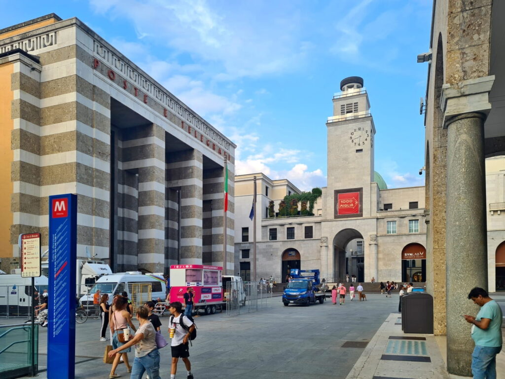 Piazza della Vittoria in Brescia, Italy, with Poste e Telegrafi building and clock tower