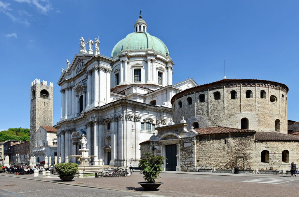 The New and Old Cathedrals side-by-side in Piazza Paolo VI, Brescia, Italy.